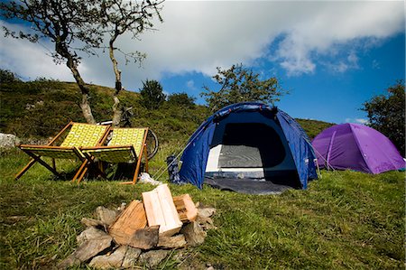 simsearch:851-02963674,k - Deck chairs,tents and campfire unlit,Cloud Farm Campsite North Devon,Exmoor,UK Stock Photo - Rights-Managed, Code: 851-02963800