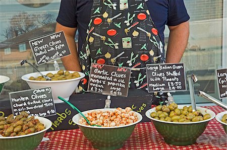 Stuffed olives and marinated garlic cloves at a Farmer's Market stall in Tunbridge Wells,Kent,England,United Kingdom Stock Photo - Rights-Managed, Code: 851-02963855