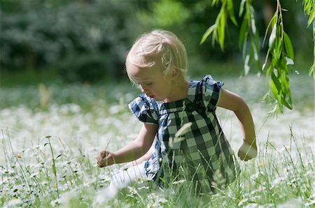 Blond girl on a flower meadow Stock Photo - Rights-Managed, Code: 853-05523504