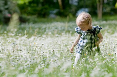 Blond girl on a flower meadow Stock Photo - Rights-Managed, Code: 853-05523503