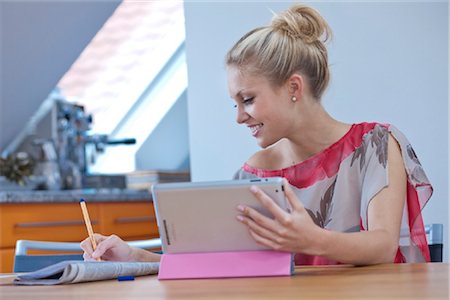 Young woman with ipad Stock Photo - Rights-Managed, Code: 853-05523600