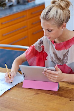 people writing numbers - Young woman with ipad Stock Photo - Rights-Managed, Code: 853-05523620