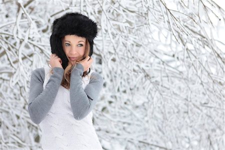 Young woman with cap in snow Stock Photo - Rights-Managed, Code: 853-05523680