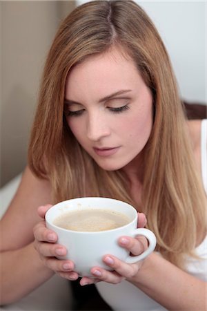 simsearch:853-05523411,k - Young woman with cup of coffee Stock Photo - Rights-Managed, Code: 853-05523805