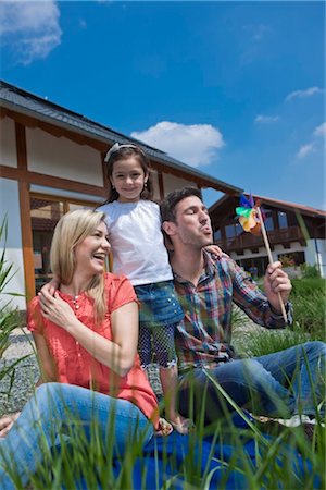 Family in front of Lehner energy house, Poing, Bavaria, Germany, Europe Stock Photo - Rights-Managed, Code: 853-05523822