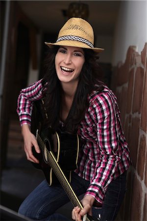 female cowboy hat - Black-haired woman ,portrait Stock Photo - Rights-Managed, Code: 853-05841013
