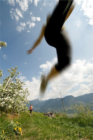 simsearch:695-05770082,k - Jogger on alpine meadow, South Tyrol, Italy Fotografie stock - Rights-Managed, Codice: 853-06120436