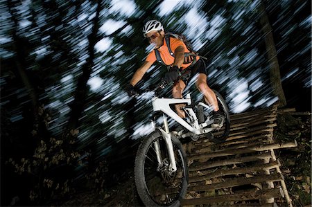 energy plant architecture - Mountainbiker on wooden bridge, South Tyrol, Italy Stock Photo - Rights-Managed, Code: 853-06120440