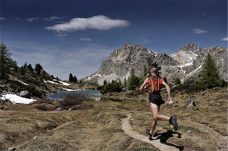 Jogger in the Dolomites, South Tyrol, Italy Stock Photo - Rights-Managed, Code: 853-06120463