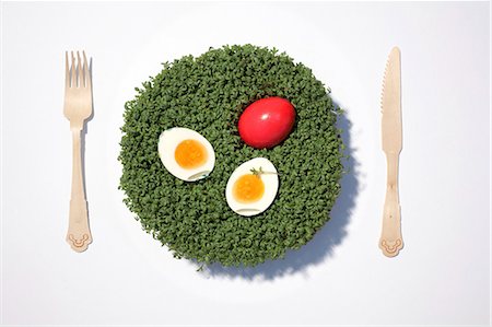 fork and knife white background - Easter egg and boiled egg on cress Stock Photo - Rights-Managed, Code: 853-06120507