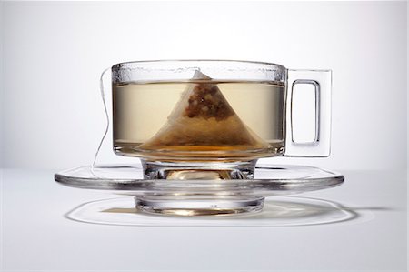 Glass of tea with teabag Foto de stock - Con derechos protegidos, Código: 853-06120524