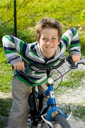 Boy with bicycle Stock Photo - Rights-Managed, Code: 853-06306025