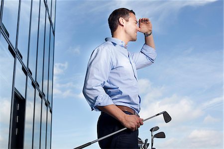 Man with golf club Stock Photo - Rights-Managed, Code: 853-06441578