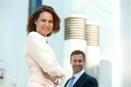 Confident businesswoman and businessman outdoors Foto de stock - Con derechos protegidos, Código: 853-06441681