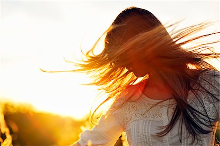 people in sunset - Young woman shaking head, Bavaria, Germany, Europe Stock Photo - Rights-Managed, Code: 853-06623274