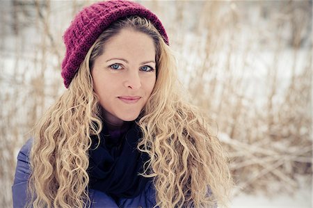 europe woman scarf - Blond woman wearing winther clothes outdoors, portrait Stock Photo - Rights-Managed, Code: 853-06623280