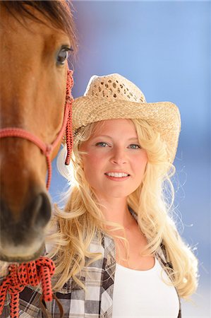 Young woman beside a horse, portrait Stock Photo - Rights-Managed, Code: 853-07148637