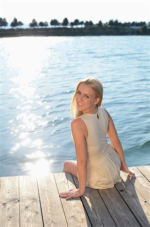 styria - Young blond woman on a jetty at a lake, Styria, Austria Stock Photo - Rights-Managed, Code: 853-07241795