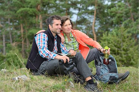 Couple taking a rest from their hiking tour Stock Photo - Rights-Managed, Code: 853-07241835