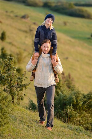 family fun in hill - Smiling father with son piggyback Stock Photo - Rights-Managed, Code: 853-07241919