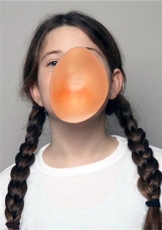 facing - Girl making chewing gum bubble Stock Photo - Rights-Managed, Code: 853-02914064