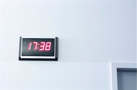 simsearch:853-02914644,k - Digital clock on wall, low angle view Stock Photo - Rights-Managed, Code: 853-02914136