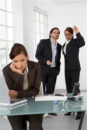 face to face shot photo - two businesspeople chatting about her colleague Stock Photo - Rights-Managed, Code: 853-02914287