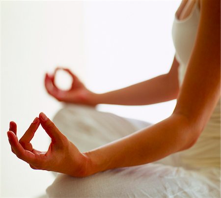 woman doing yoga, close-up Stock Photo - Rights-Managed, Code: 853-02914418