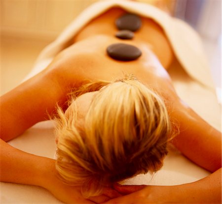 female body massage photo - woman doing the Lastone therapy Stock Photo - Rights-Managed, Code: 853-02914427