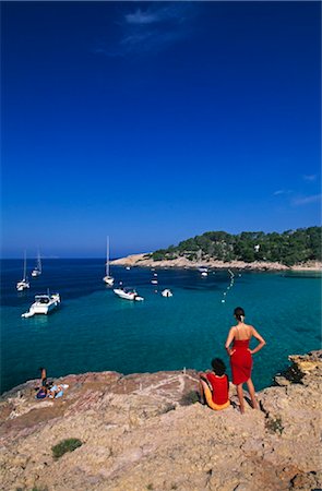 pityusen islands - woman at Cala Salad, Ibiza, Spain Foto de stock - Con derechos protegidos, Código: 853-02914467