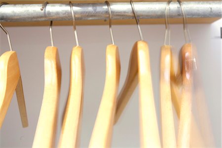 hanger in a wooden board, close-up Foto de stock - Con derechos protegidos, Código: 853-02914649