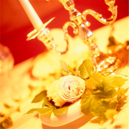 rose and candle holder, close-up Foto de stock - Con derechos protegidos, Código: 853-02914695