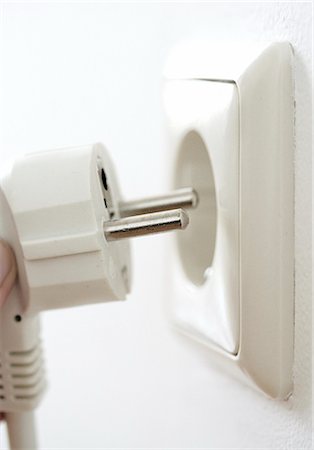 plug and a socket, close-up Stock Photo - Rights-Managed, Code: 853-02914711