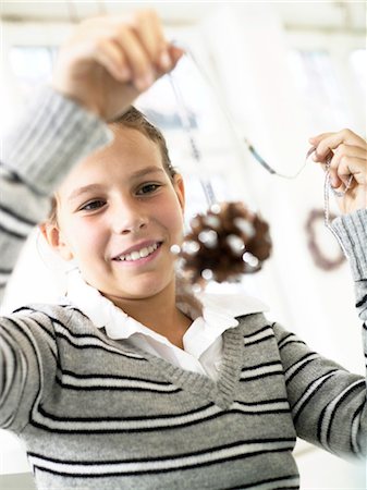 Girl doing crafts Stock Photo - Rights-Managed, Code: 853-02913817