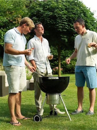 small man - Adultes ayant des fêtes en plein air Photographie de stock - Rights-Managed, Code: 853-02913929