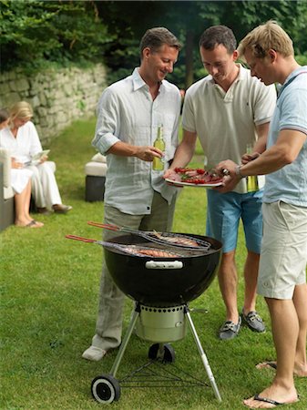 fish barbeque - Adults having garden party Stock Photo - Rights-Managed, Code: 853-02913923