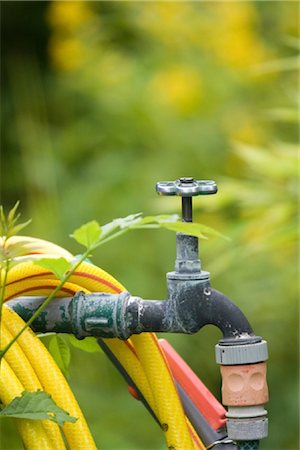 faucet and hosepipe, Germany Fotografie stock - Rights-Managed, Codice: 853-03227828