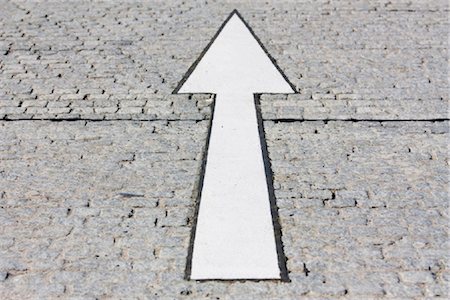 Arrow on the ground of a parking place, Berlin, Germamy Stock Photo - Rights-Managed, Code: 853-03227844