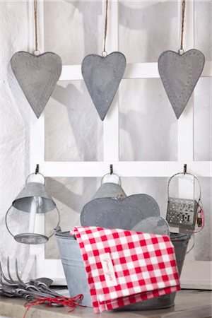 pail - Decoration made of metal hanging above a bucket with a dishtowel Stock Photo - Rights-Managed, Code: 853-03458939