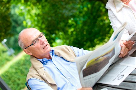 Senior couple reading newspaper on the terrace Stock Photo - Rights-Managed, Code: 853-03616995