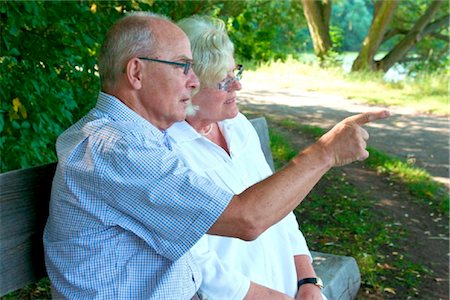 eyeglasses for seniors images - Senior couple talking on park bench Stock Photo - Rights-Managed, Code: 853-03617036