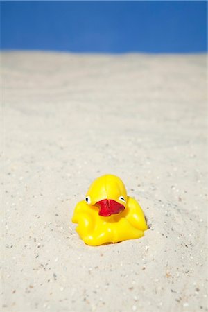 rubber duck - Rubber duck at beach Stock Photo - Rights-Managed, Code: 853-03776297