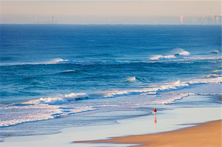 simsearch:862-03887245,k - Australien, Queensland, Sonne, Strand, Mann zu Fuß am Strand Stockbilder - Lizenzpflichtiges, Bildnummer: 862-05996762
