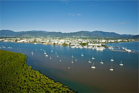 photograph of cairns city aerial - Australia, Queensland, Cairns.  Aerial view of yachts on Trinity Inlet and city centre. Stock Photo - Rights-Managed, Code: 862-05996816