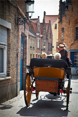 Tours in horse carriages in the center of Bruges, Flanders, Belgium Foto de stock - Con derechos protegidos, Código: 862-05996834