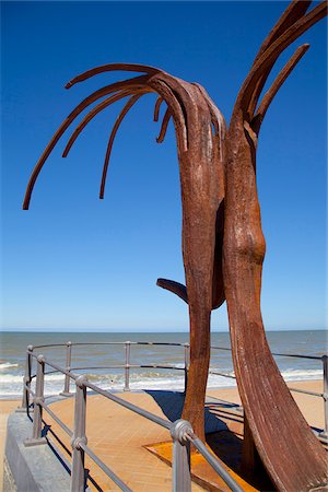 The 'Dansende Golven' sculpture (Dancing Waves') by Patrick Steenon the main promenade of the beach in Ostend, Belgium Stock Photo - Rights-Managed, Code: 862-05996849