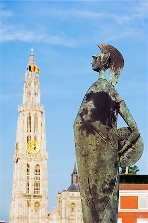 simsearch:862-05996859,k - Europe, Belgium, Flanders, Antwerp, bronze statue and tower of Onze Lieve Vrouwekathedraal, built 1352-1521 Stock Photo - Rights-Managed, Code: 862-05996858