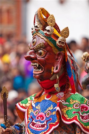 Masked dancing at Trashi Chhoe Dzong, a monastery now also housing the secretariat, the throne room and offices of the King. Stock Photo - Rights-Managed, Code: 862-05996910