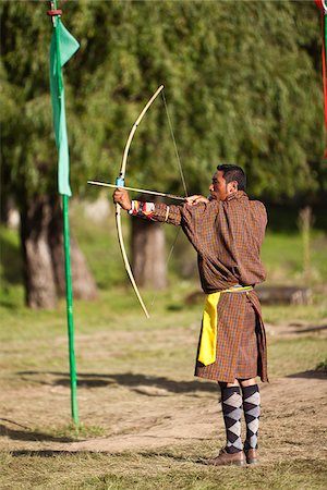 Archery competition with traditional bamboo bow and arrow. Foto de stock - Con derechos protegidos, Código: 862-05996998