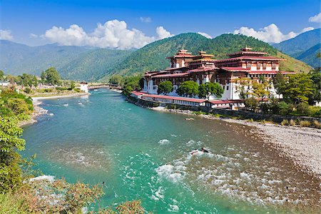 Punakha Dzong, at the confluence of two rivers, was the venue of the Fifth King of Bhutan's Royal Wedding. Stock Photo - Rights-Managed, Code: 862-05997035